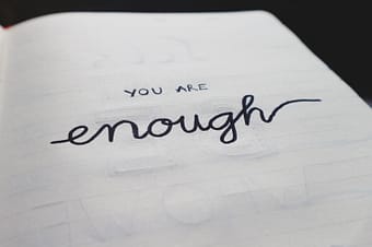 "You are enough" written on page