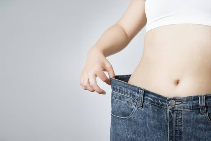 woman in jeans with very loose waistband