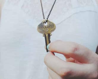 Key inscribed with the word "fearless"