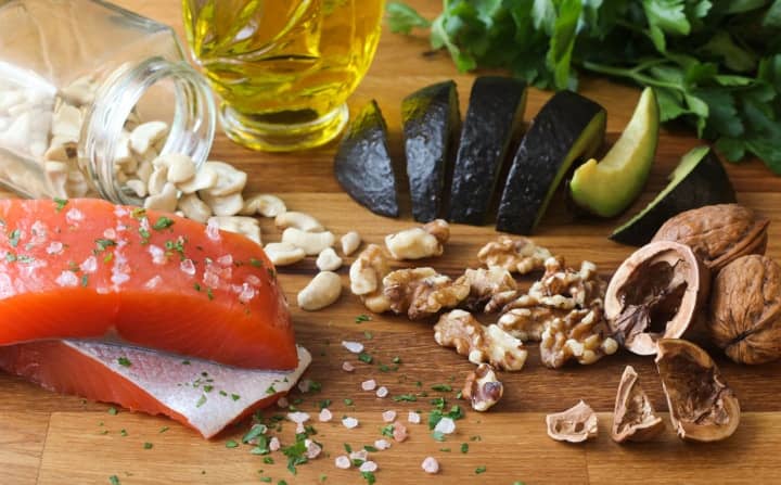 raw salmon, avocados, and walnuts are part of an anti-inflammatory diet