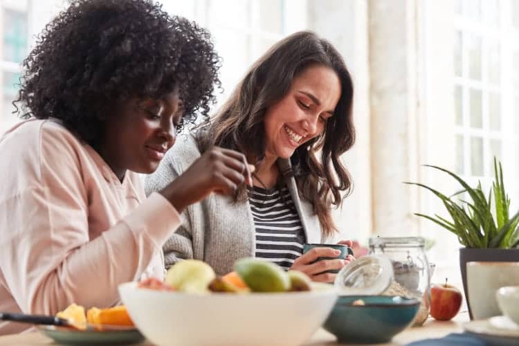 Two overweight women having lunch together